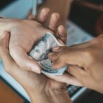 individuals are giving bribes to officials in orde wqz4z9h