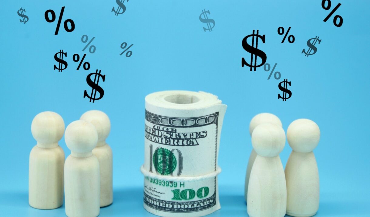 wooden figure with profit icon investment concept yk9j6hb