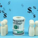 wooden figure with profit icon investment concept yk9j6hb
