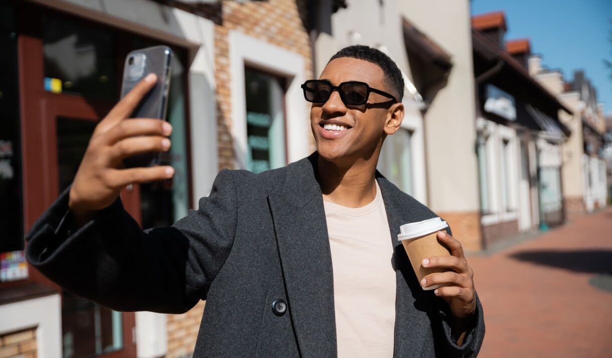 stylish and cheerful african american man in sungl lkubybf